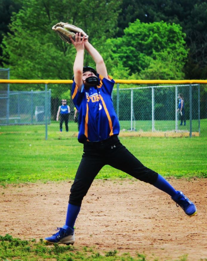 Travel softball line drive shot denied at SS!