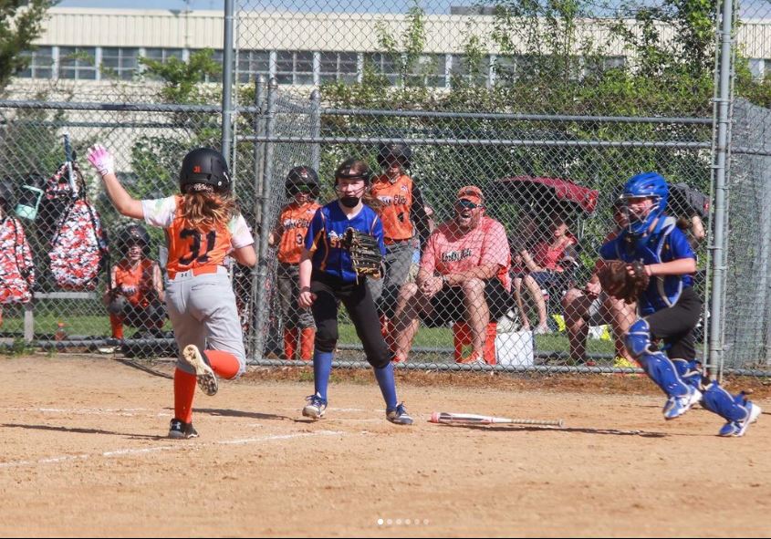 Fastpitch softball play at the plate!